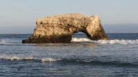 A closer view of the remaining arch near shore at Natural Bridges State Beach.