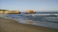 Looking over Natural Bridges State Beach towards the lone remaining arch.