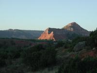 As the Sun comes up light strikes the red claystone slopes.